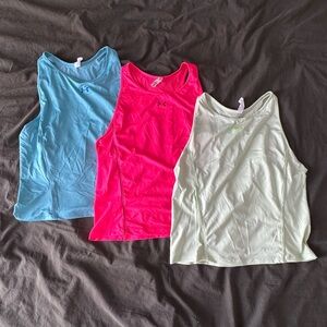 3 Under Armour Tank Tops in Blue, Pink, and Green
